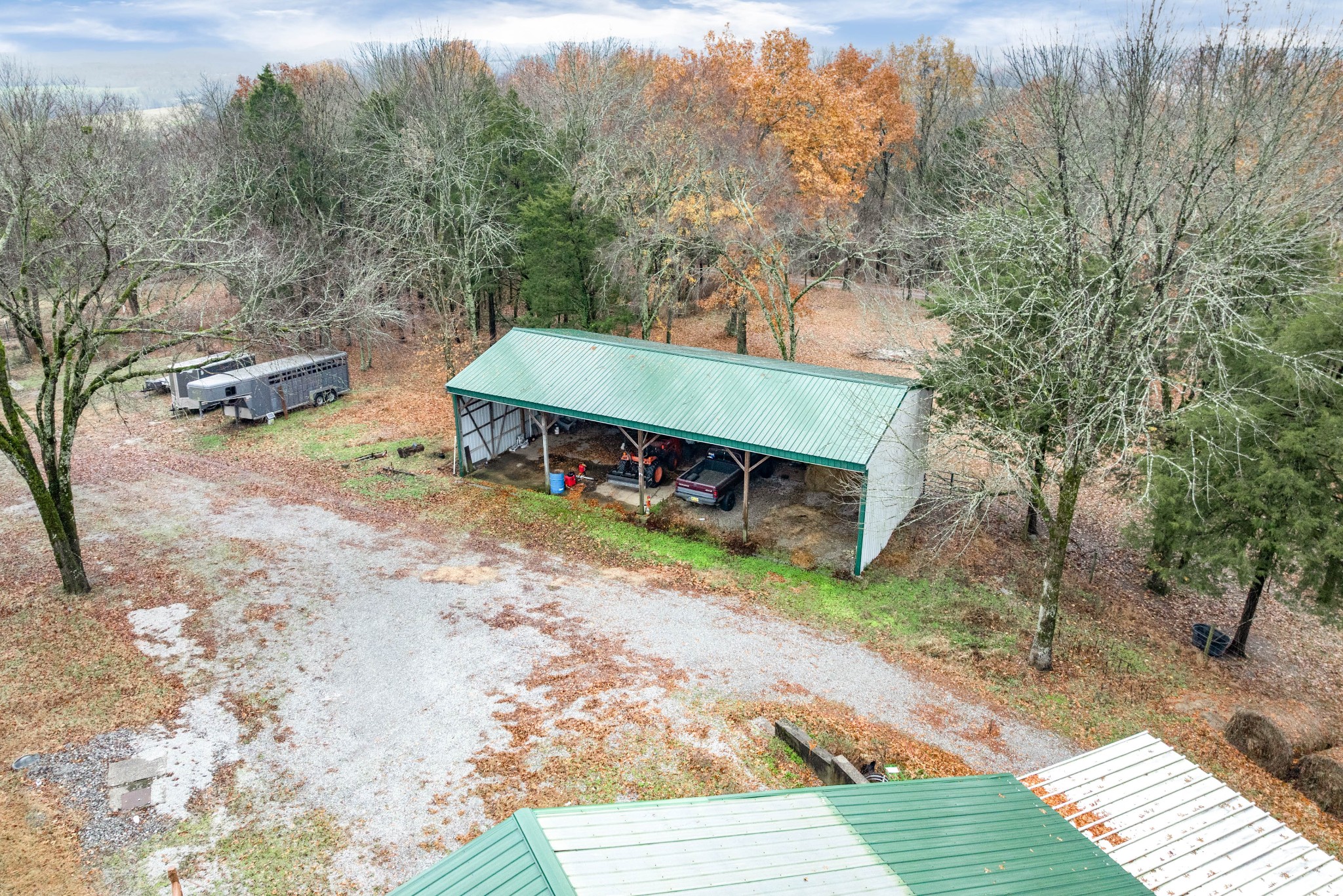 545 Puryears Bend Road Hartsville, TN 37074 - Photo 40 of 46 a backyard of a house with table and chairs