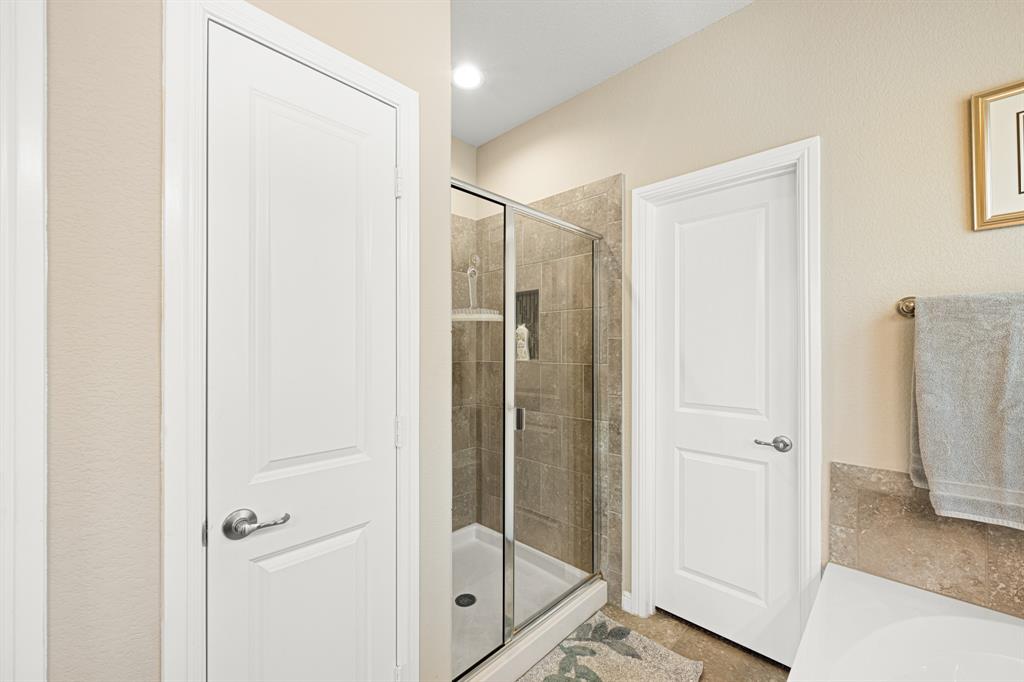 916 Falcon Road Argyle, TX 76226 - Photo 28 of 37 Bathroom featuring an enclosed shower