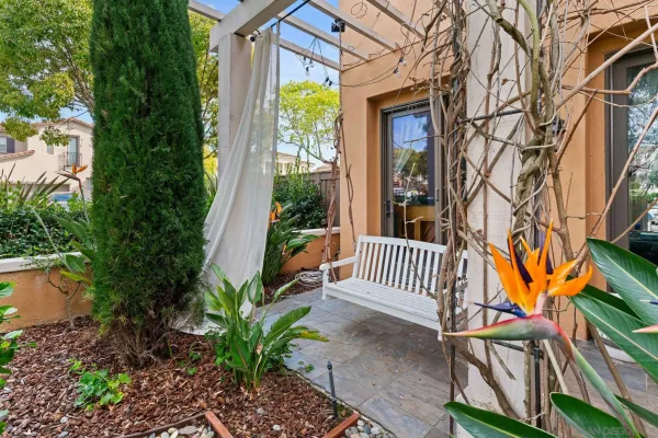 a view of a chair and table in the patio
