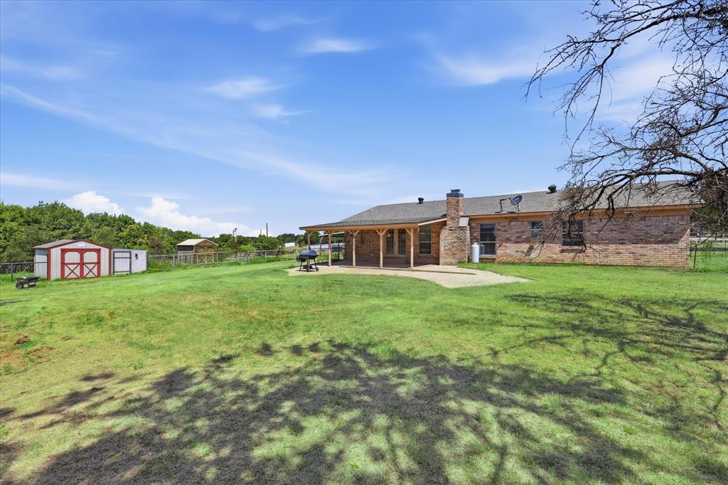 892 Highland Circle Springtown, TX 76082 - Photo 31 of 40 Open green space.