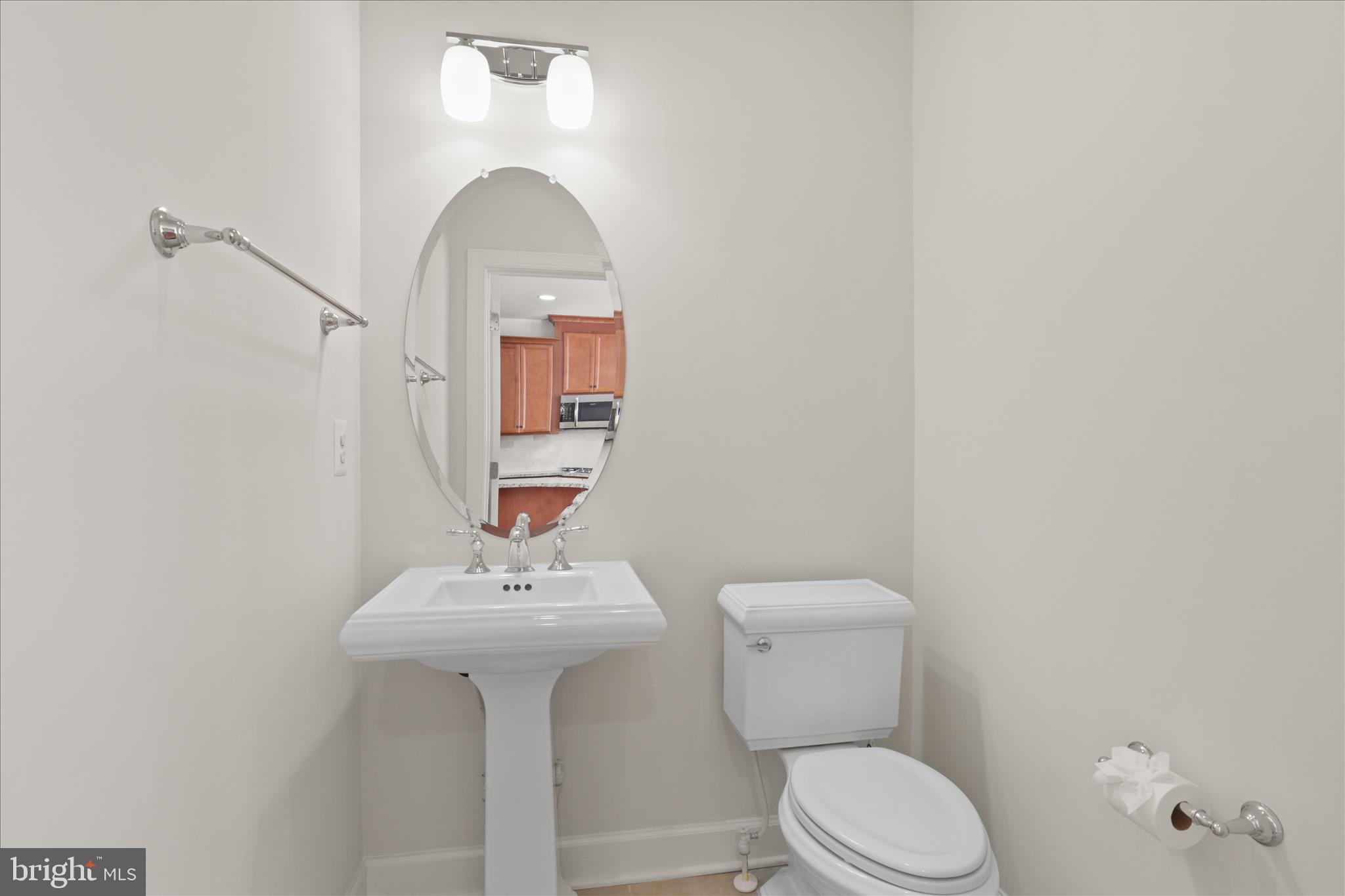 3755 Signal Knob Court Falls Church, VA 22041 - Photo 17 of 46 a bathroom with a toilet sink and mirror