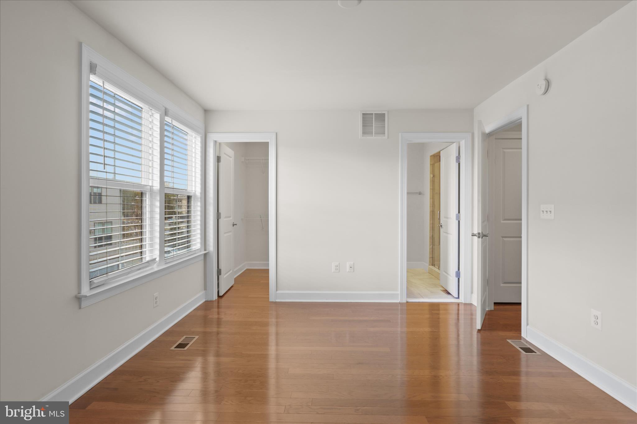 3755 Signal Knob Court Falls Church, VA 22041 - Photo 20 of 46 a view of an empty room with wooden floor and a window