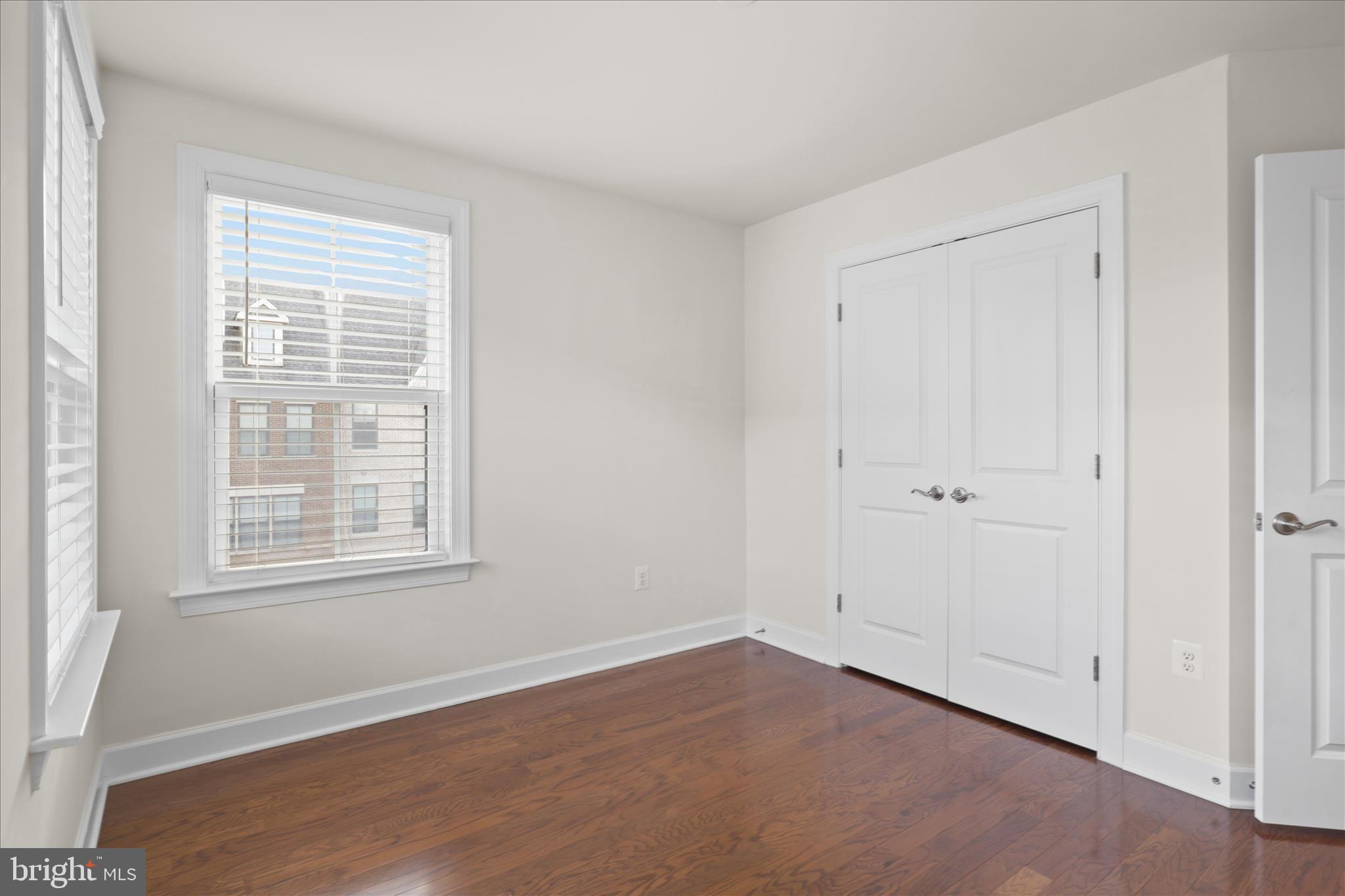 3755 Signal Knob Court Falls Church, VA 22041 - Photo 28 of 46 a view of an empty room with wooden floor and a window