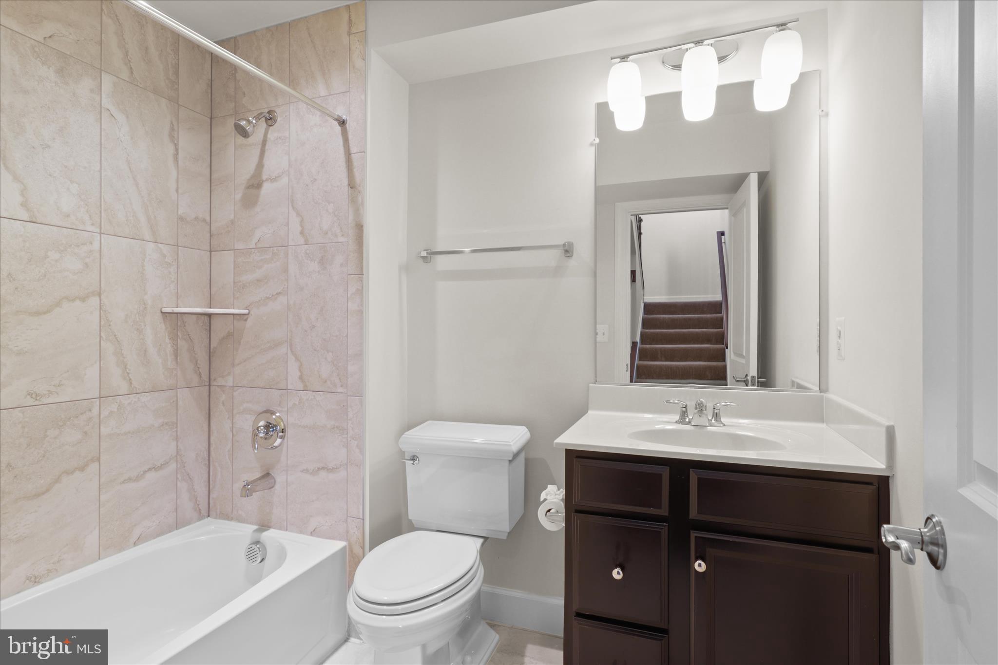 3755 Signal Knob Court Falls Church, VA 22041 - Photo 29 of 46 a bathroom with a sink a toilet and shower