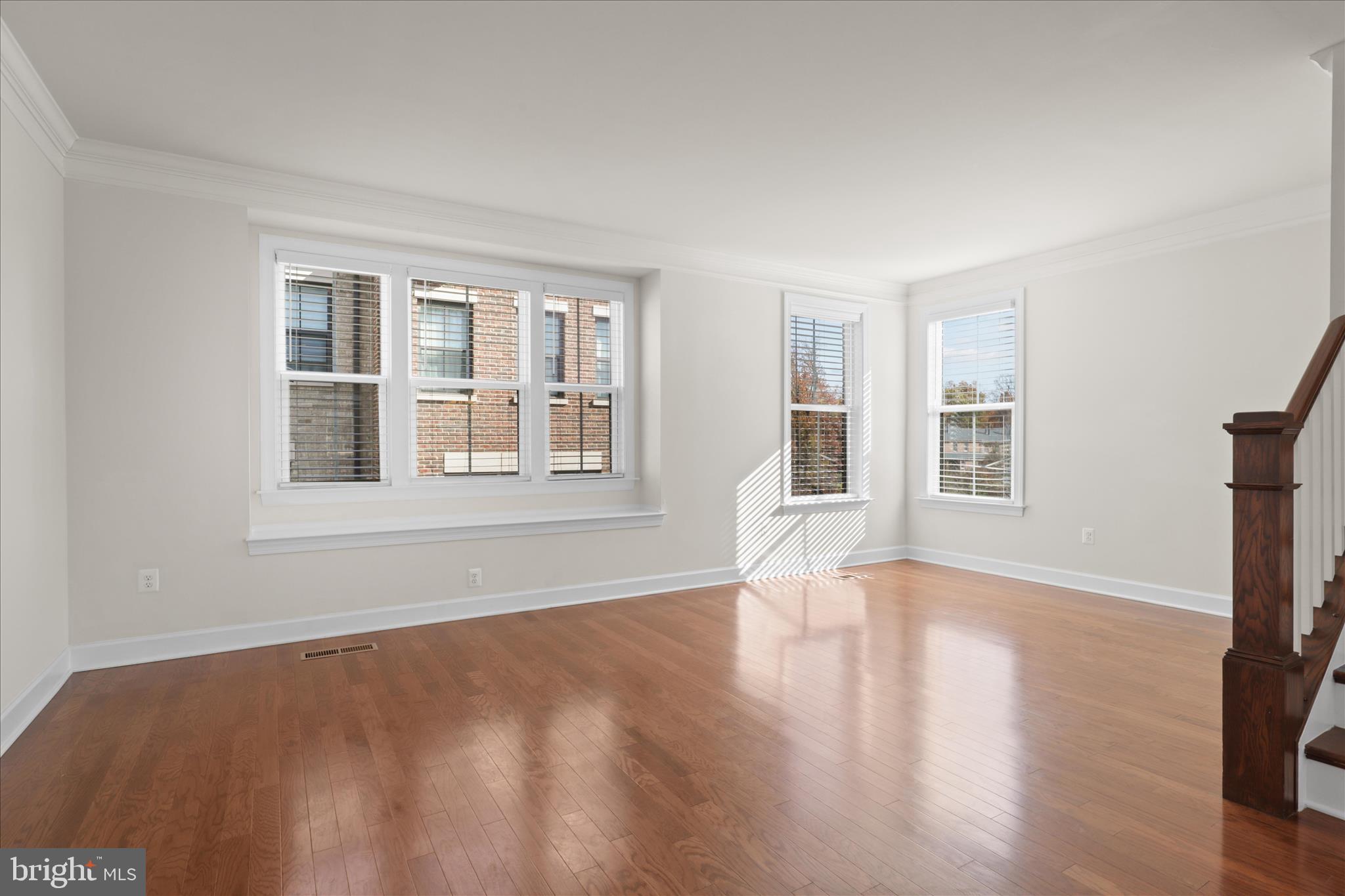 3755 Signal Knob Court Falls Church, VA 22041 - Photo 9 of 46 a view of an empty room with wooden floor and a window