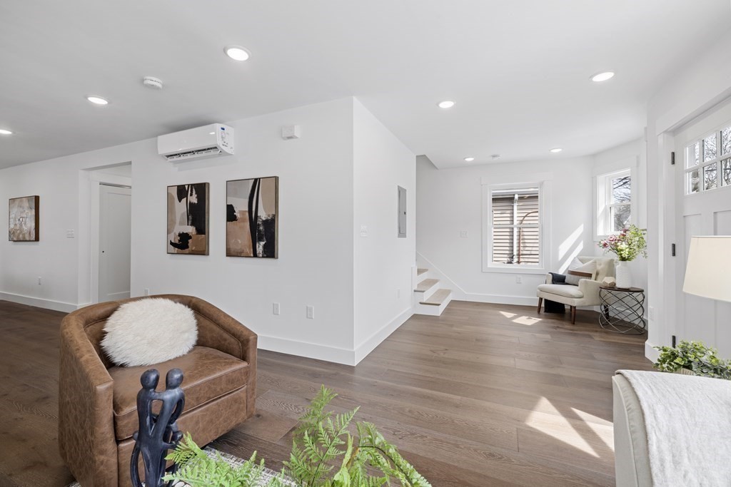 58 Simpson Avenue, Unit 2 Somerville, MA 02144 - Photo 13 of 28 a living room with furniture