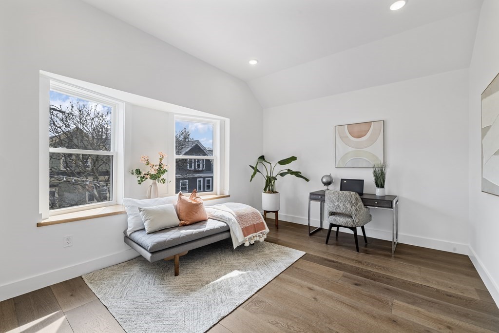 58 Simpson Avenue, Unit 2 Somerville, MA 02144 - Photo 16 of 28 a living room with furniture and a window