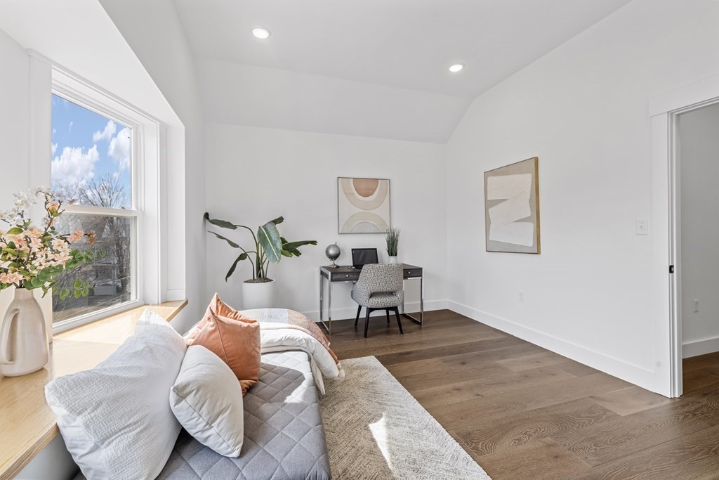 58 Simpson Avenue, Unit 2 Somerville, MA 02144 - Photo 18 of 28 a living room with furniture