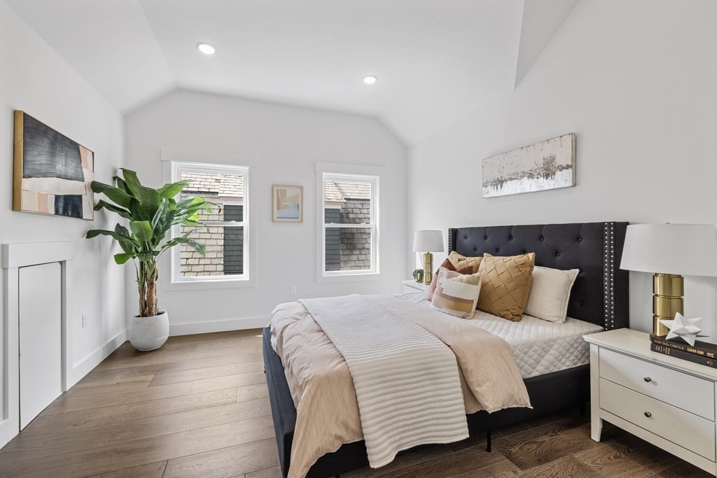 58 Simpson Avenue, Unit 2 Somerville, MA 02144 - Photo 19 of 28 a bedroom with bed and a potted plant