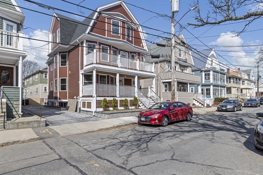58 Simpson Avenue, Unit 2 Somerville, MA 02144 - Photo 2 of 28 a cars parked in front of a building