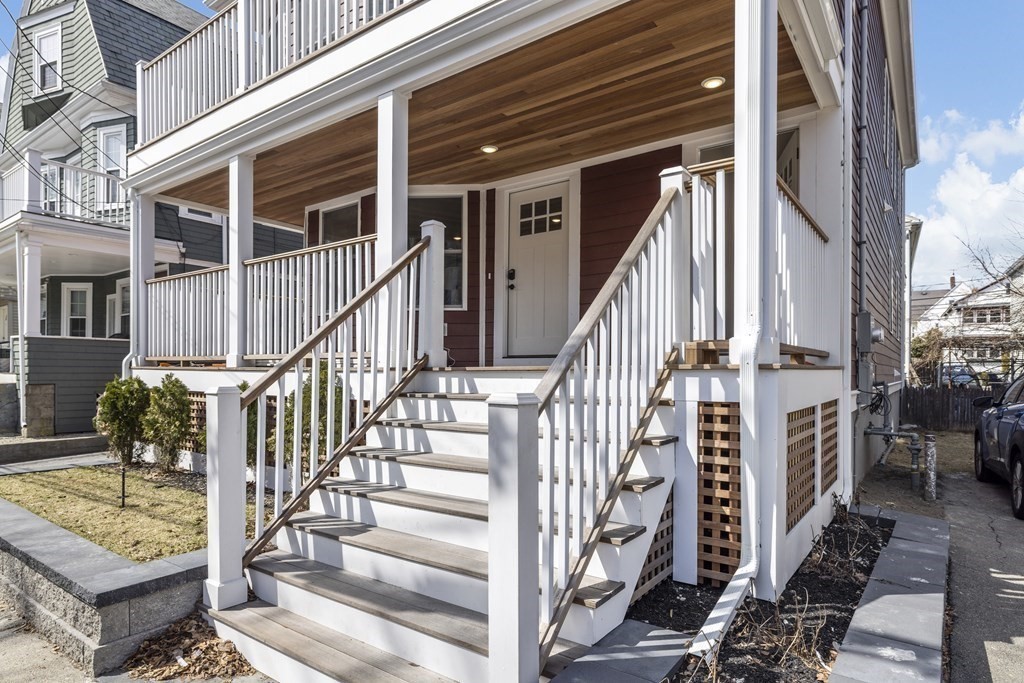 58 Simpson Avenue, Unit 2 Somerville, MA 02144 - Photo 24 of 28 a view of front door of house with stairs