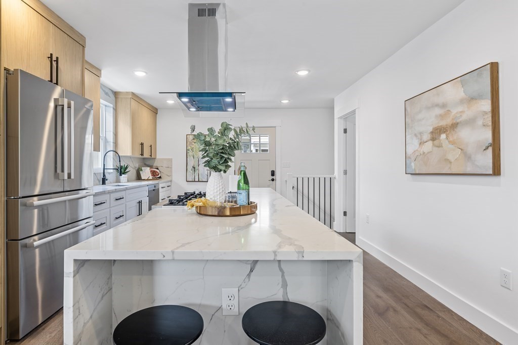 58 Simpson Avenue, Unit 2 Somerville, MA 02144 - Photo 7 of 28 a kitchen with refrigerator and sink