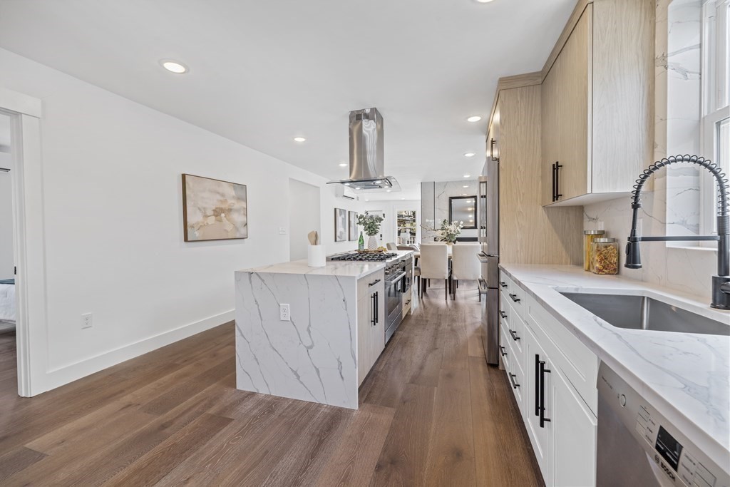 58 Simpson Avenue, Unit 2 Somerville, MA 02144 - Photo 8 of 28 a kitchen with sink cabinets and wooden floor