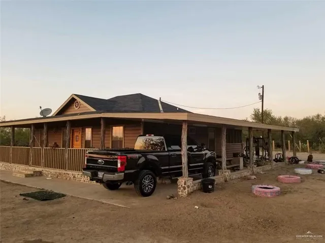 a car parked in front of a house