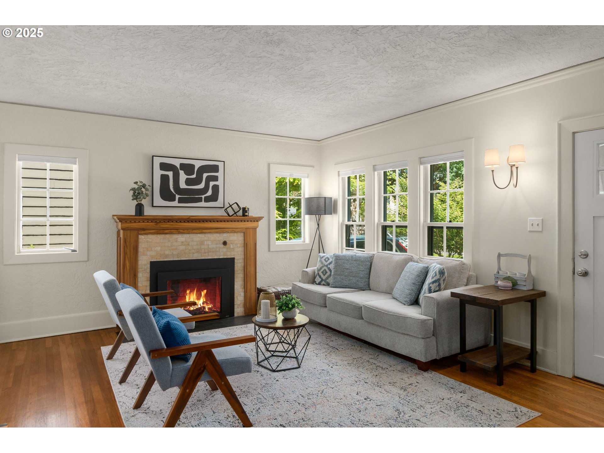 6807 Southeast 34th Avenue Portland, OR 97202 - Photo 6 of 39 a living room with furniture and a fireplace