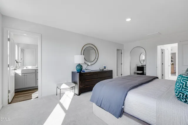 a bed room with a bed and a window