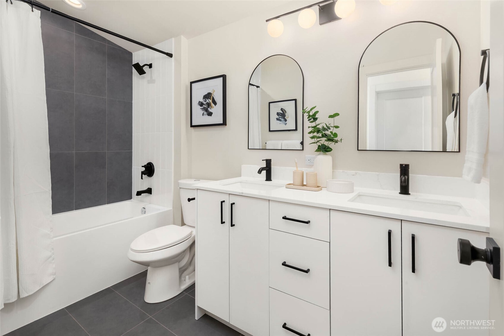 3812 South Eddy Street Seattle, WA 98118 - Photo 17 of 19 a bathroom with a sink toilet and shower