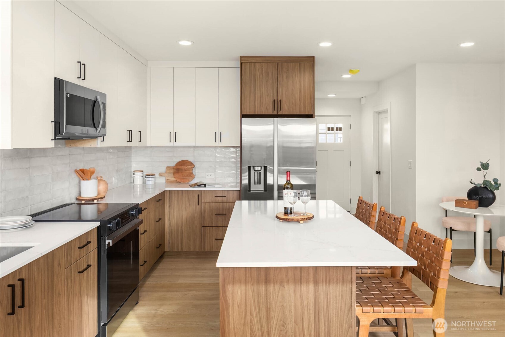 3812 South Eddy Street Seattle, WA 98118 - Photo 5 of 19 a kitchen with a sink a stove and cabinets