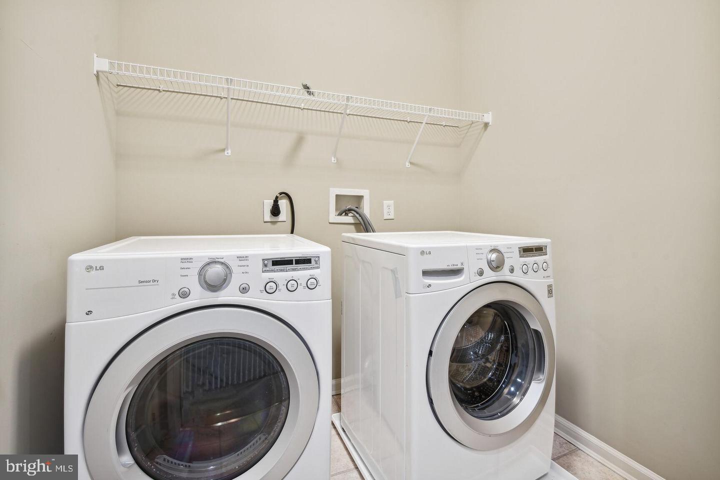 337 Main Street Gaithersburg, MD 20878 - Photo 23 of 35 a view of entryway with washer and dryer