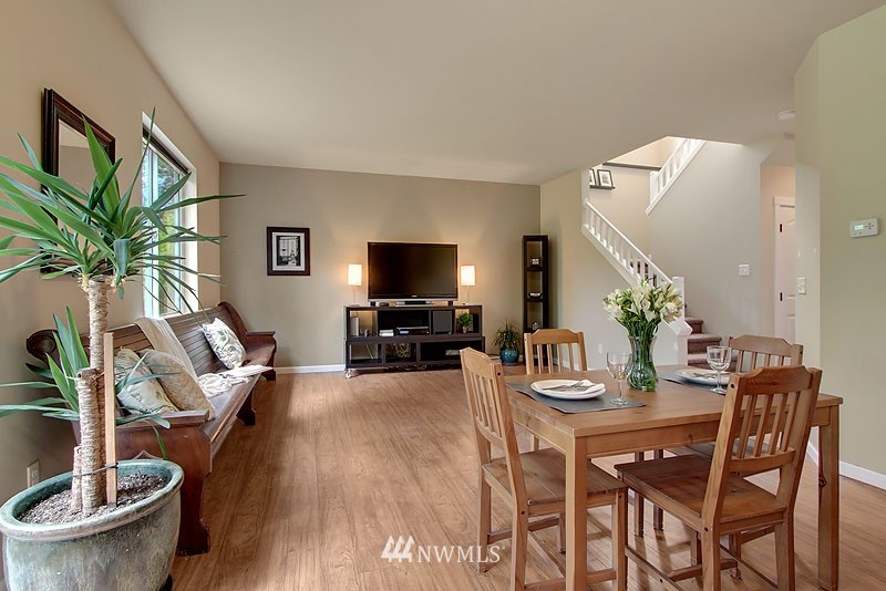 325 Field Place Northeast Renton, WA 98059 - Photo 6 of 13 a living room with furniture and a potted plant