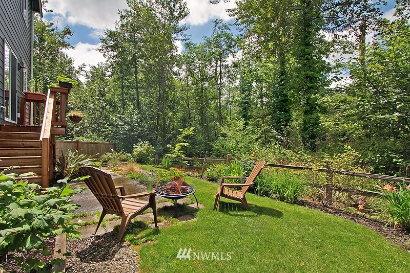 325 Field Place Northeast Renton, WA 98059 - Photo 7 of 13 a view of a bench in the garden