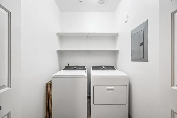 a utility room with dryer and washer