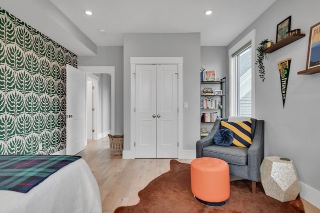 a bedroom with a bed and furniture