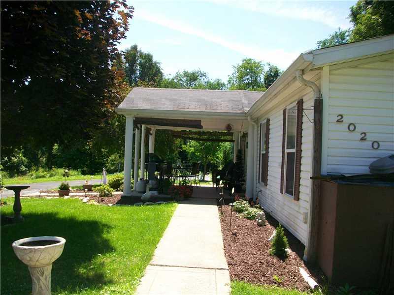 2020 Renton Road Plum, PA 15239 - Photo 7 of 13 Exterior Front. Front covered concrete porch