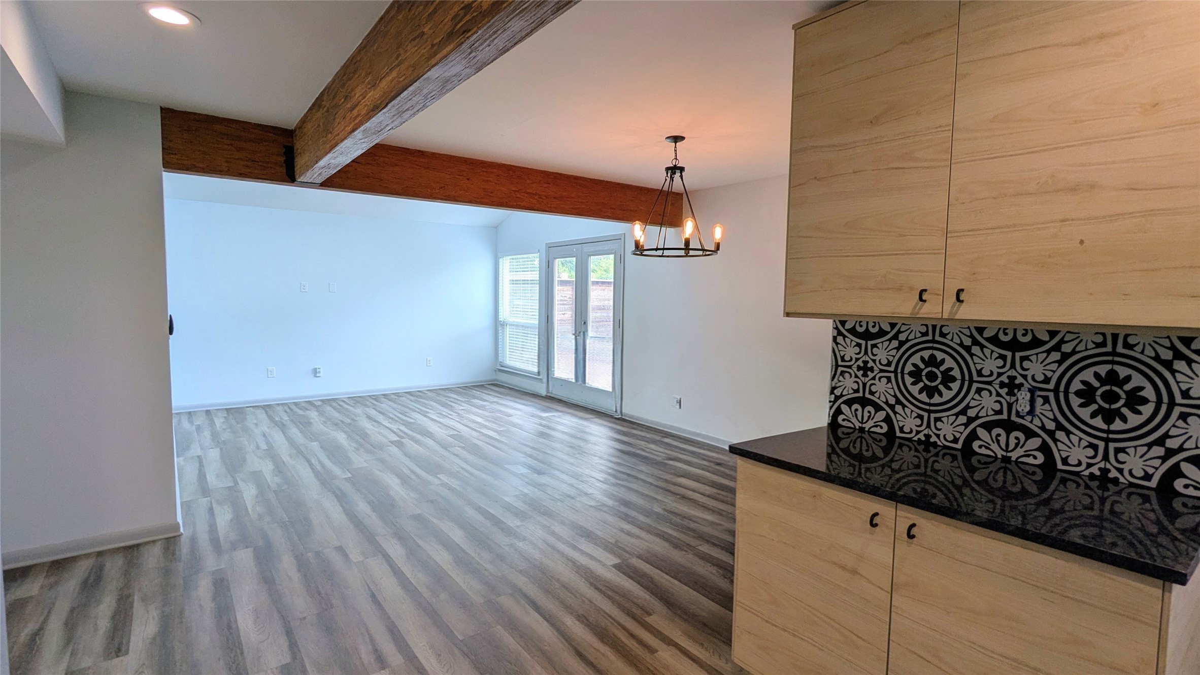 4505 Teri Road, Unit A Austin, TX 78744 - Photo 6 of 23 Exposed wood beams add a rustic touch to this inviting living space.