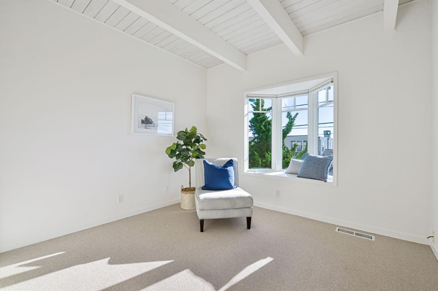 615 Beach Drive Aptos, CA 95003 - Photo 23 of 37 a living room with furniture and a potted plant