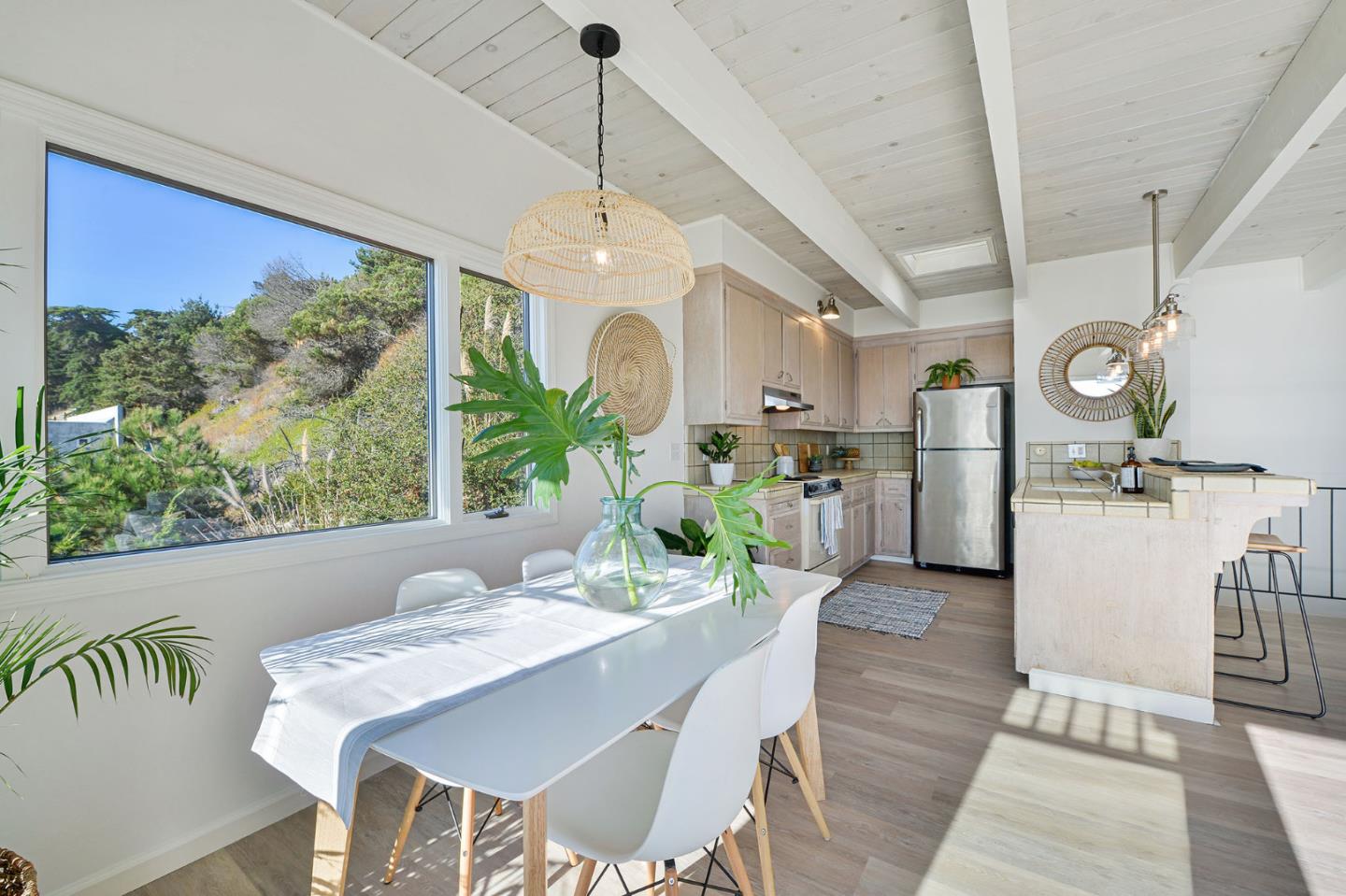 615 Beach Drive Aptos, CA 95003 - Photo 10 of 37 a view of a dining room with furniture window and wooden floor