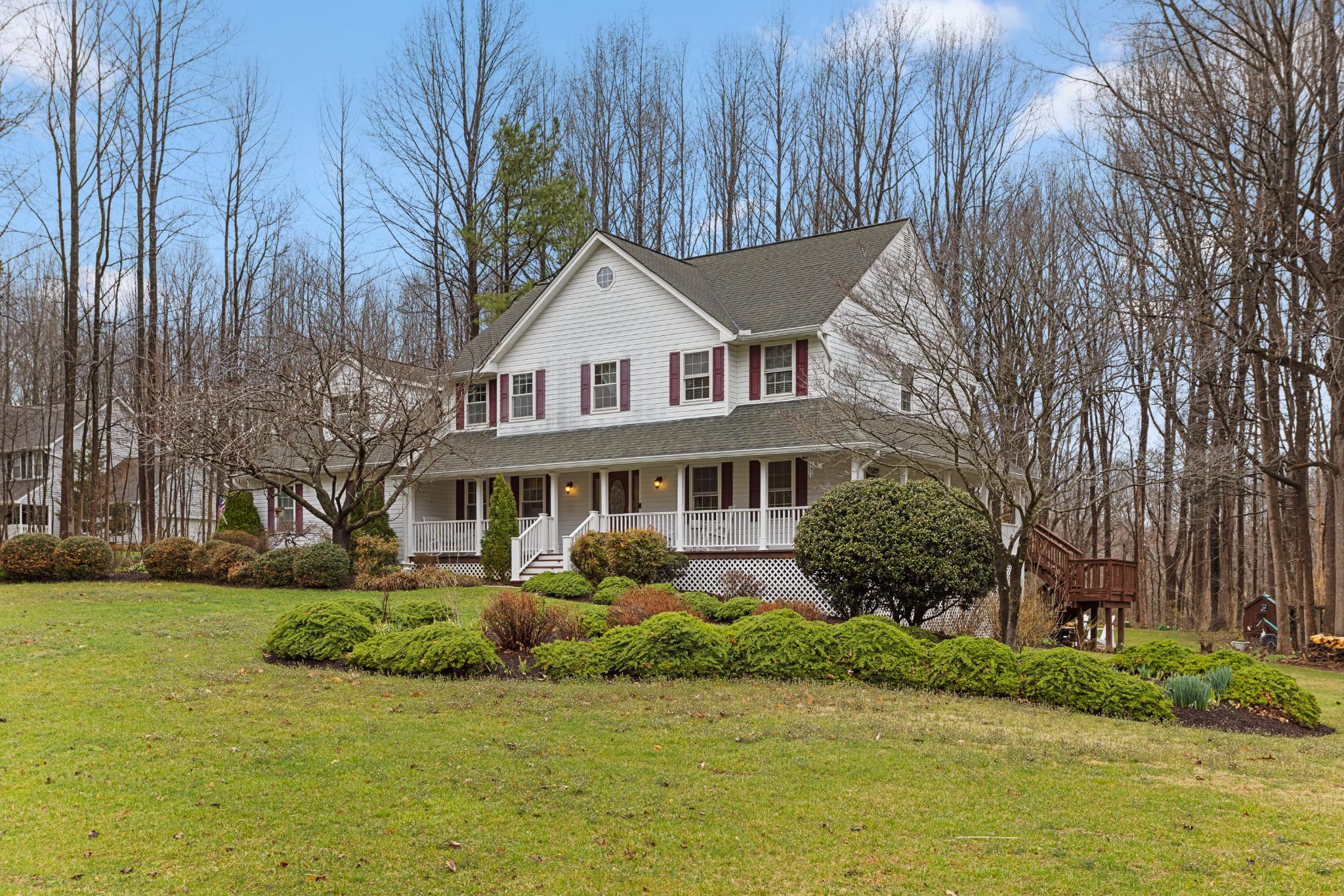 1860 Battery Lane Owings, MD 20736 - Photo 113 of 120 a front view of a house with a garden