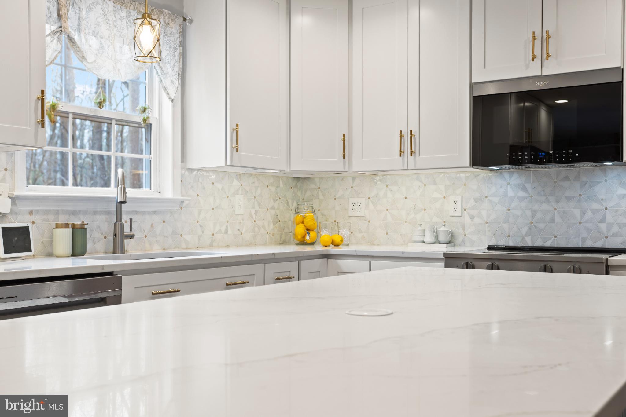 1860 Battery Lane Owings, MD 20736 - Photo 20 of 120 Bright and airy modern kitchen elegance.