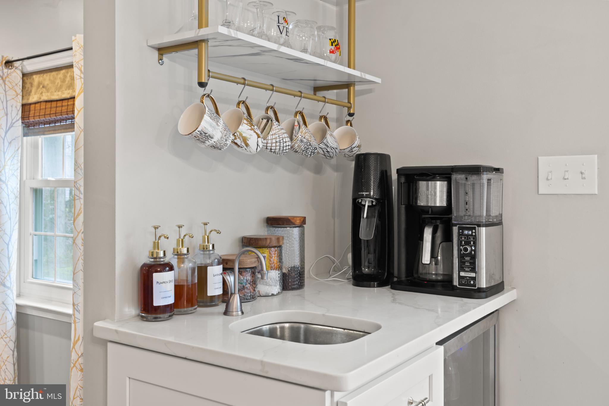 1860 Battery Lane Owings, MD 20736 - Photo 24 of 120 Charming coffee nook with stylish accents.