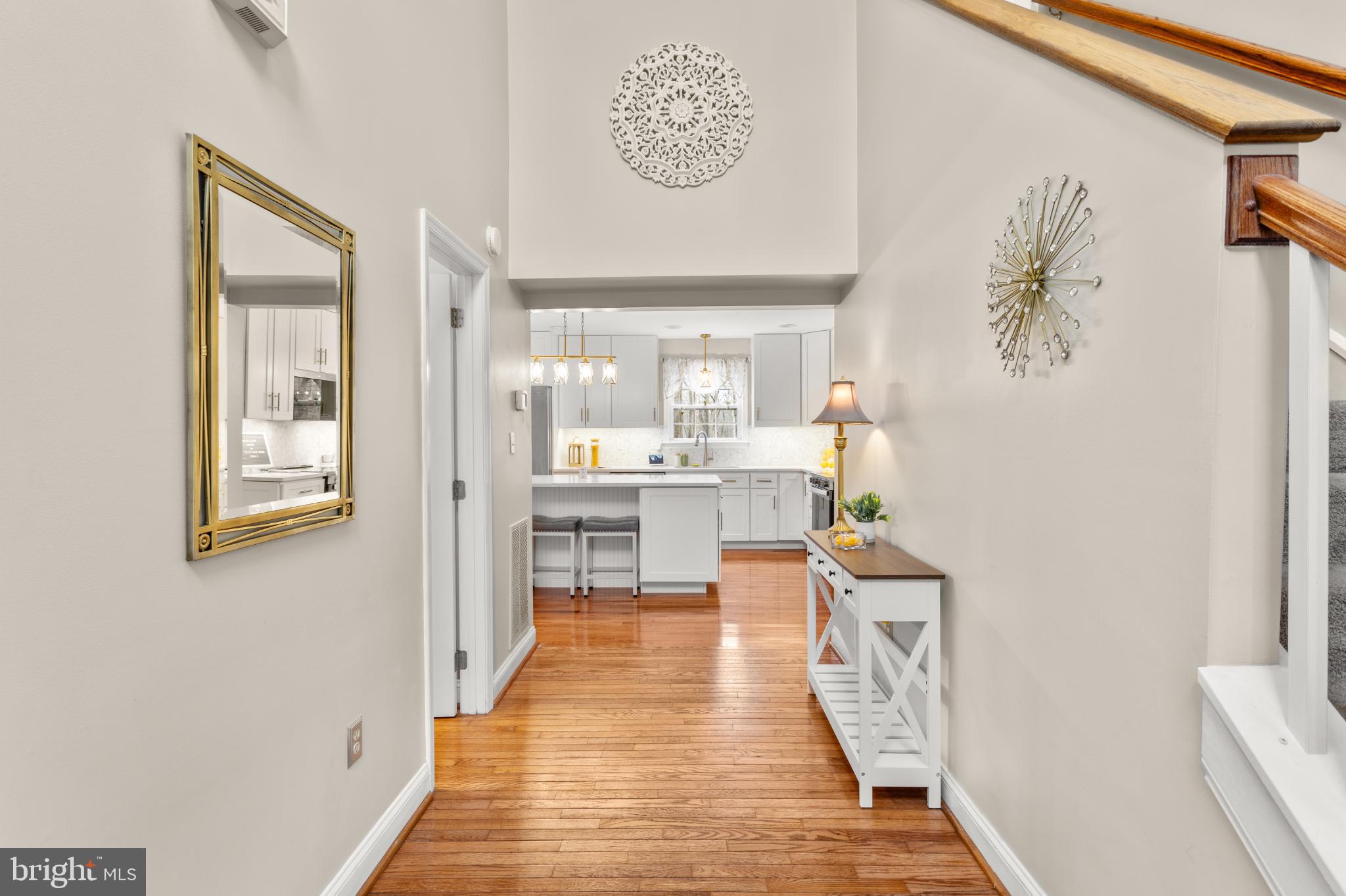 1860 Battery Lane Owings, MD 20736 - Photo 36 of 120 a view of a hallway with wooden floor
