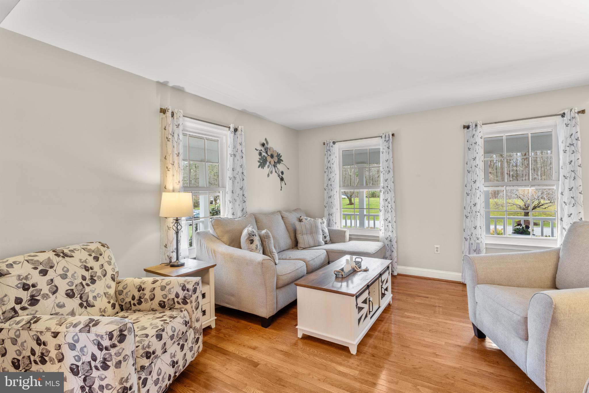 1860 Battery Lane Owings, MD 20736 - Photo 43 of 120 a living room with furniture and a large window