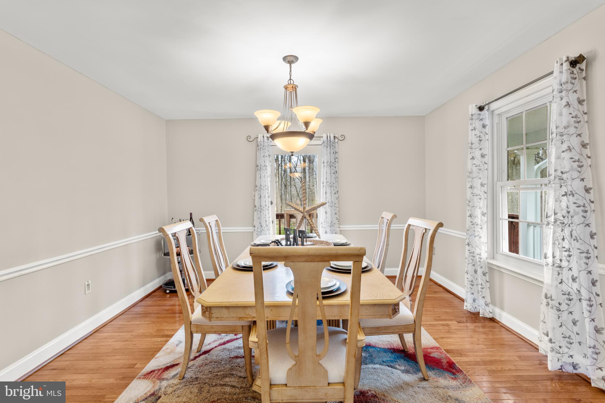 1860 Battery Lane Owings, MD 20736 - Photo 44 of 120 Elegant dining space with natural light.