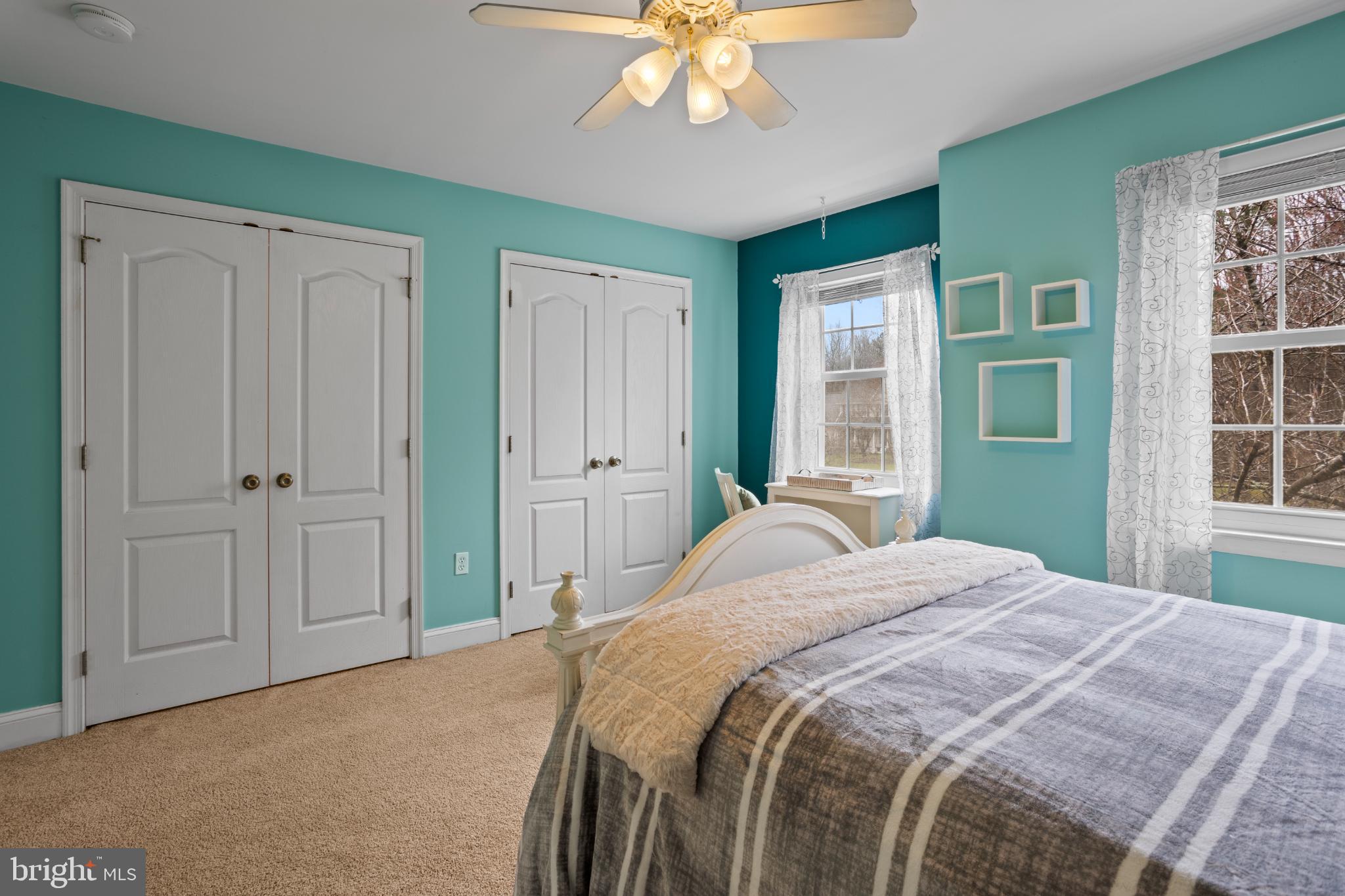 1860 Battery Lane Owings, MD 20736 - Photo 64 of 120 a bedroom with a bed and a window