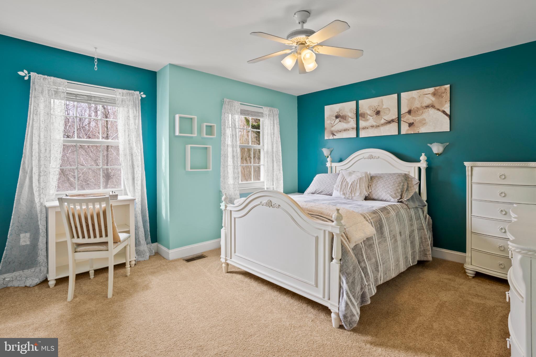 1860 Battery Lane Owings, MD 20736 - Photo 65 of 120 Serene bedroom with calming teal accents.