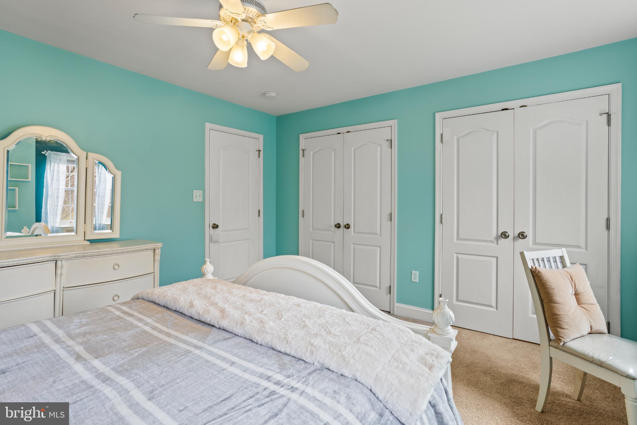 1860 Battery Lane Owings, MD 20736 - Photo 68 of 120 Serene bedroom with calming turquoise walls.