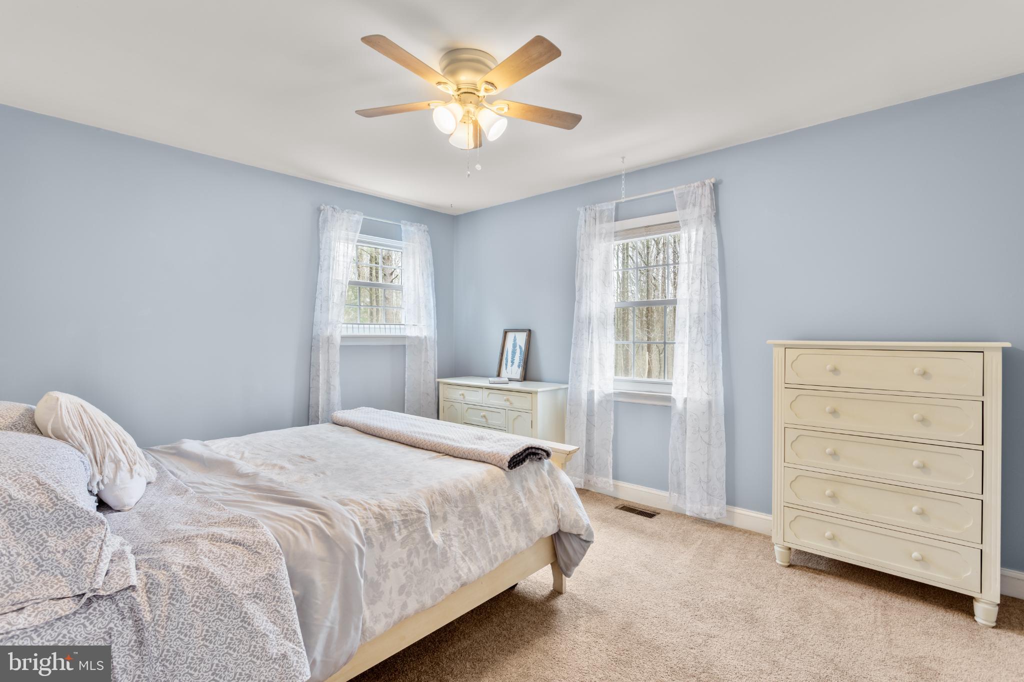 1860 Battery Lane Owings, MD 20736 - Photo 72 of 120 a bedroom with a bed and a window