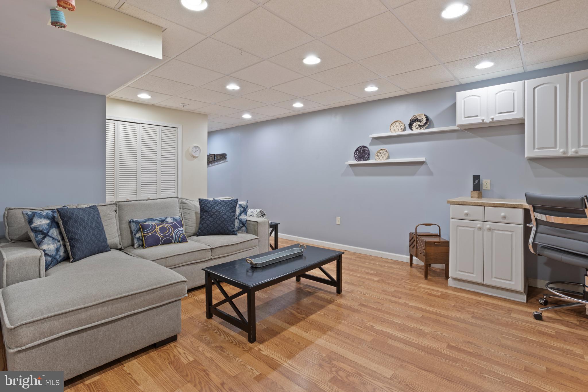 1860 Battery Lane Owings, MD 20736 - Photo 94 of 120 Cozy basement retreat with modern charm.