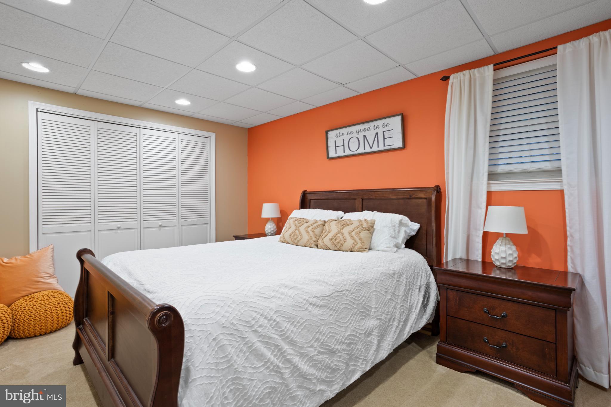 1860 Battery Lane Owings, MD 20736 - Photo 99 of 120 a bedroom with a bed and a dresser