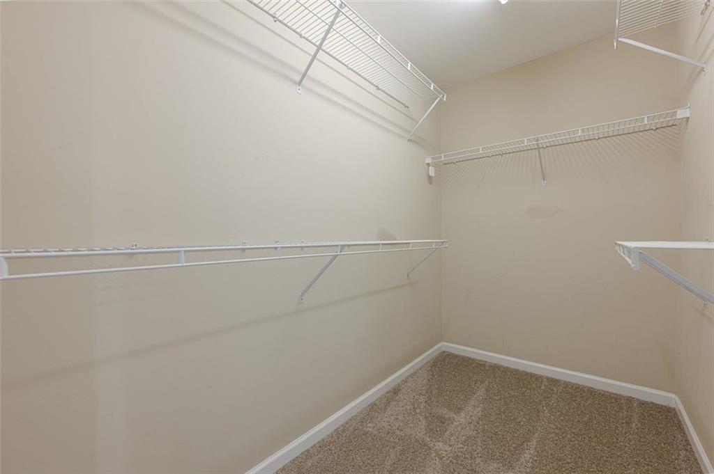 5589 Trace Views Drive Norcross, GA 30071 - Photo 31 of 58 a view of a room with racks on the wall