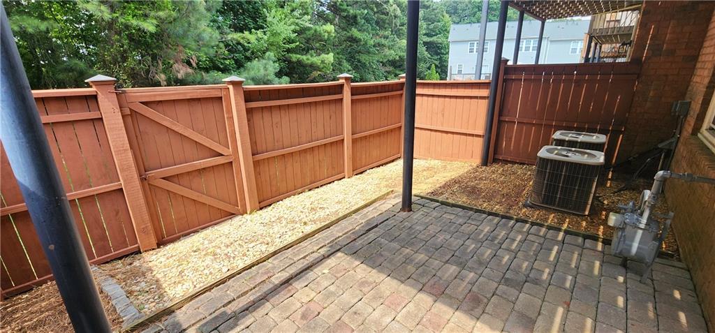 5589 Trace Views Drive Norcross, GA 30071 - Photo 38 of 58 a view of a balcony with wooden floor
