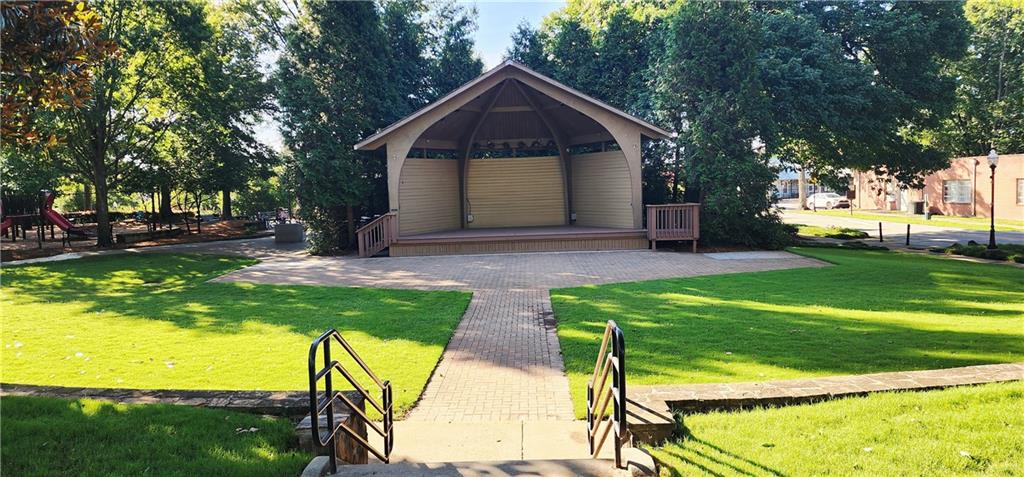 5589 Trace Views Drive Norcross, GA 30071 - Photo 51 of 58 a front view of a house with garden