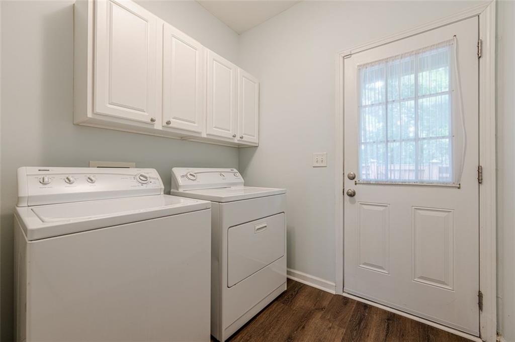 5589 Trace Views Drive Norcross, GA 30071 - Photo 6 of 58 a utility room with dryer and washer