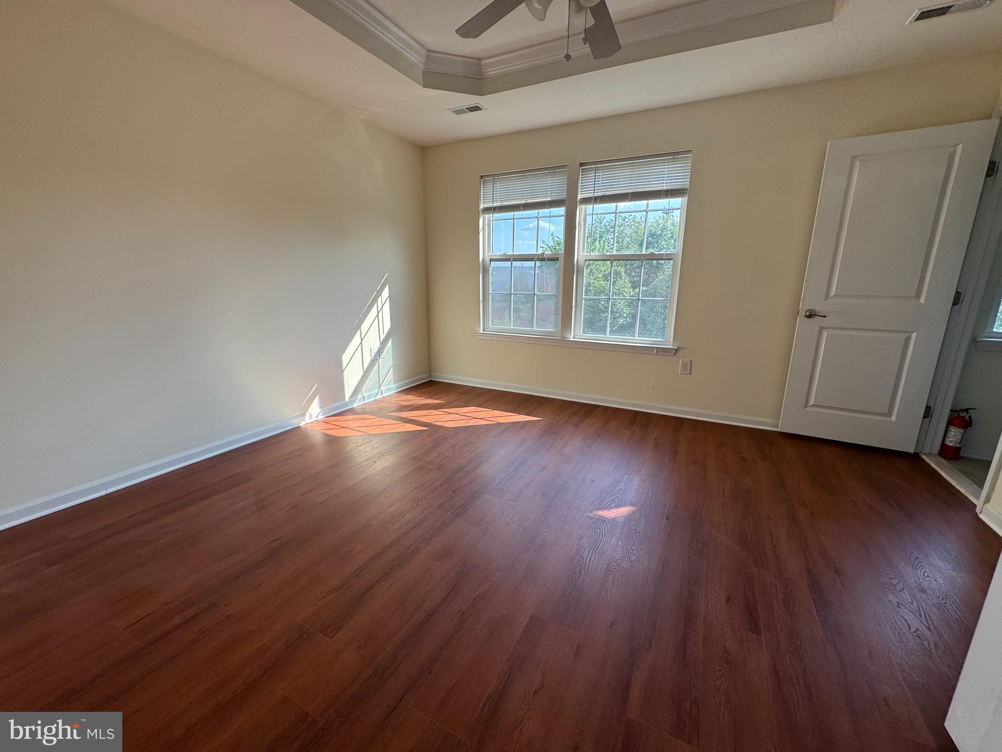 814 Susan Circle North Wales, PA 19454 - Photo 21 of 39 an empty room with wooden floor and windows