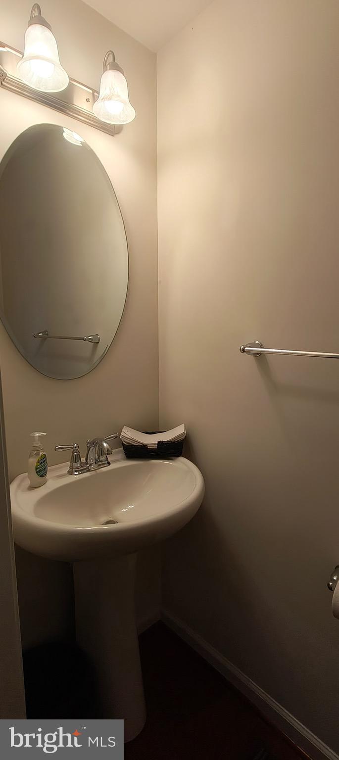 814 Susan Circle North Wales, PA 19454 - Photo 23 of 39 a bathroom with a sink toilet and mirror