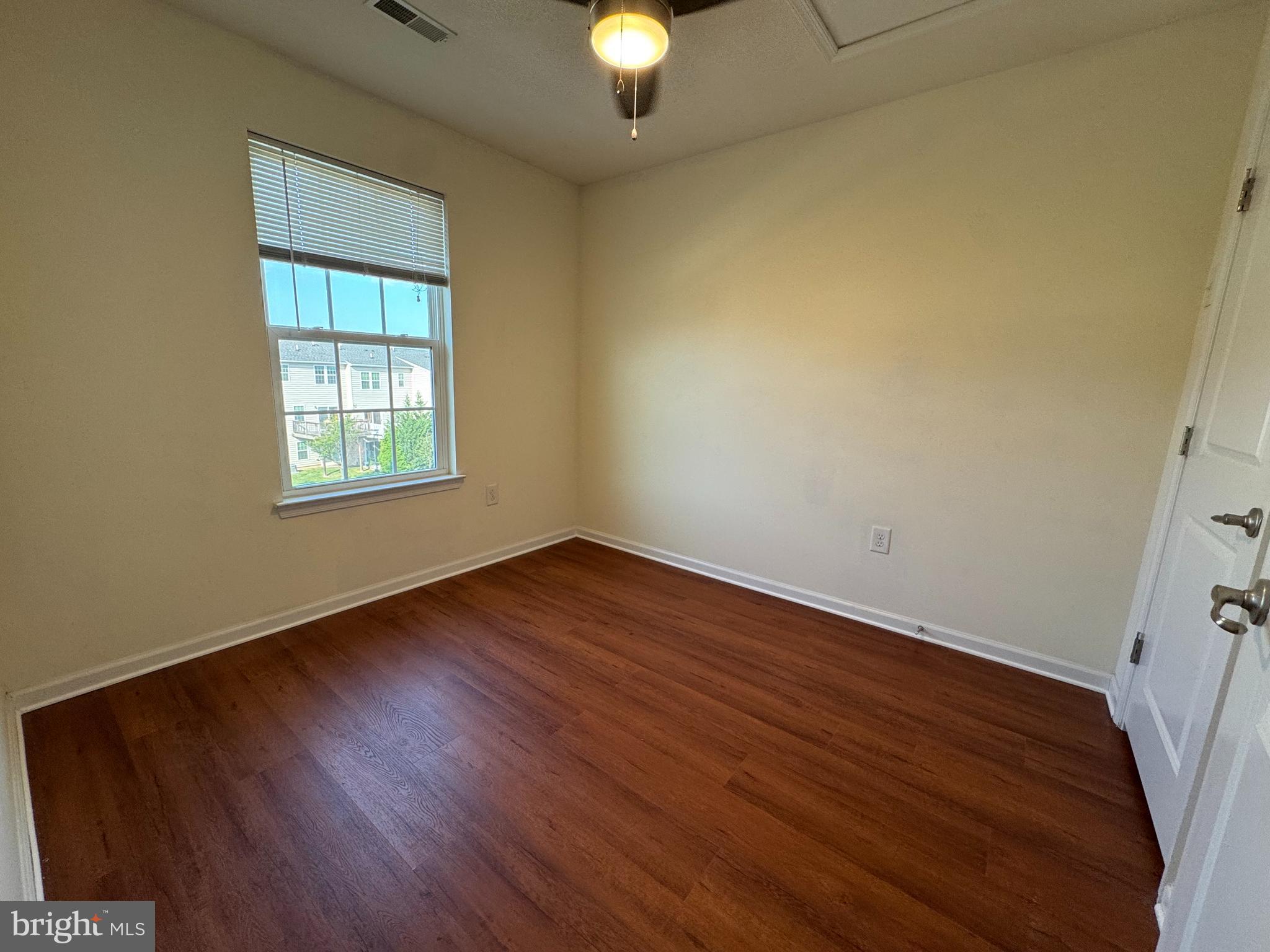 814 Susan Circle North Wales, PA 19454 - Photo 32 of 39 an empty room with wooden floor and windows